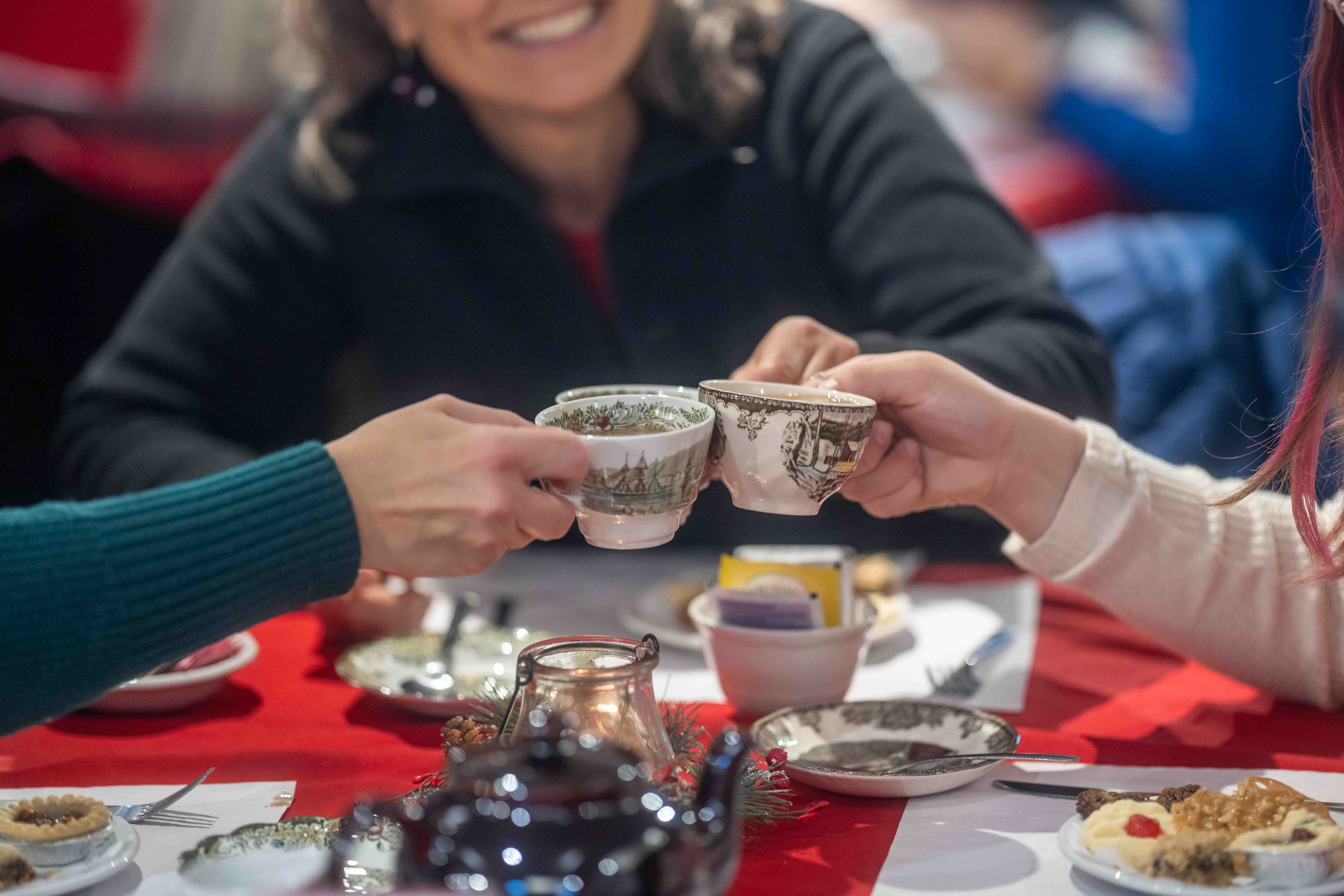 A group of friends enjoying tea together