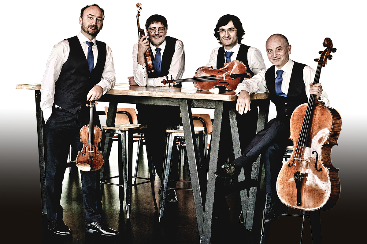 Four happy musicians with two violins, a viola and a cello