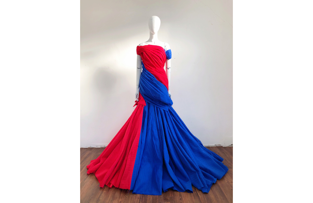 A red and blue floor-length gown on a mannequin.