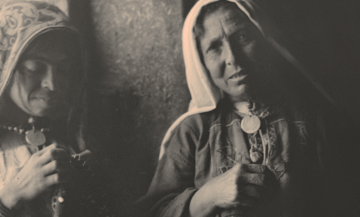 Archival photo of Palestinian women in their traditional attire.