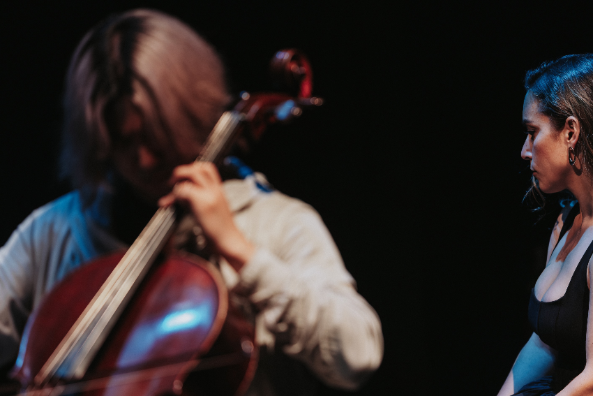 Photo of two musicians performing