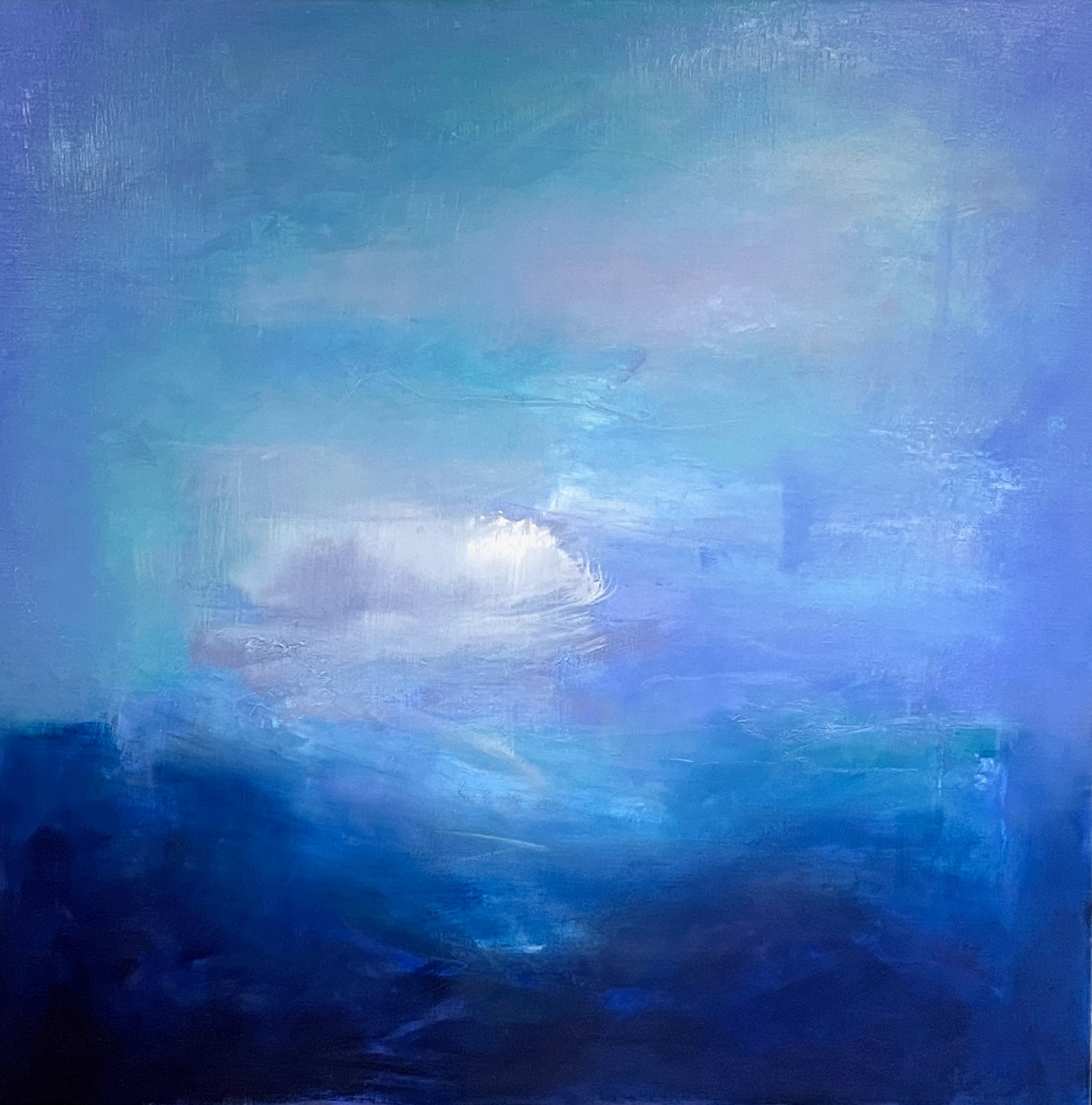 Colourful blue painting of various hues and depths of blues reflecting the lake water and sky